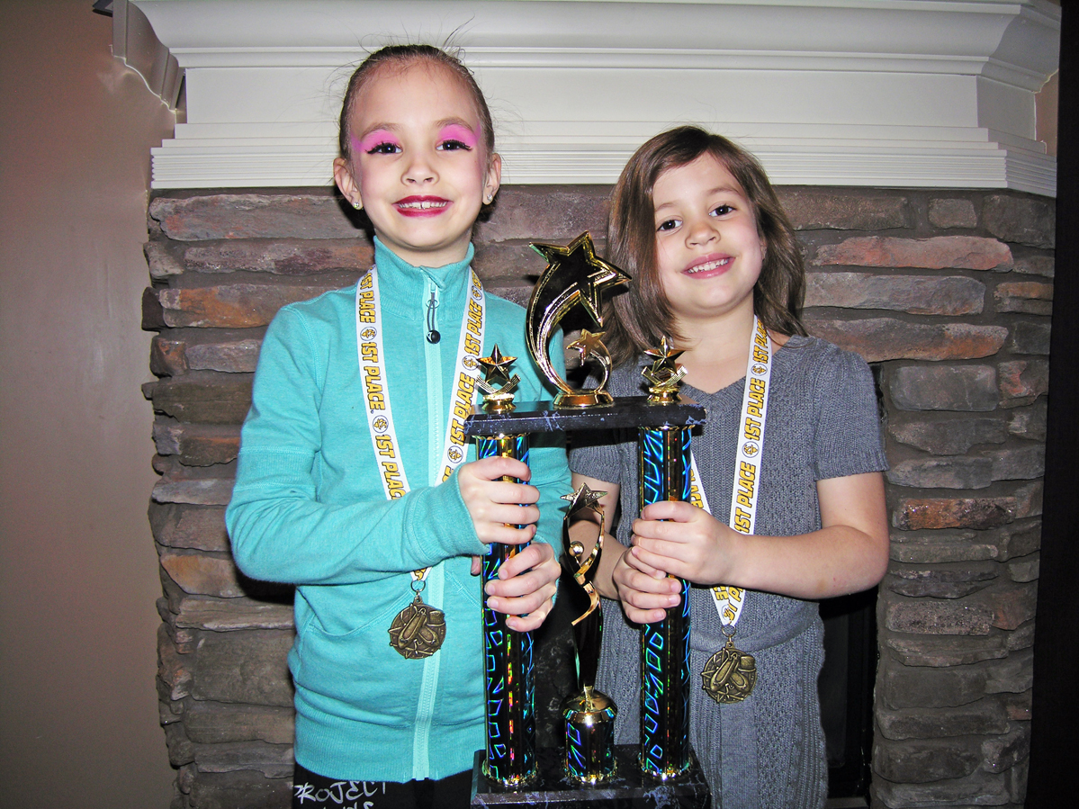 Brook and Makena w/ trophy