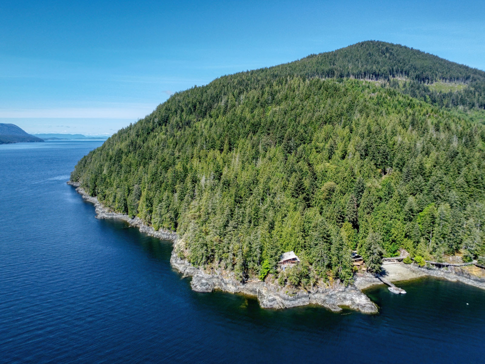 Jervis Inlet Oceanfront Acreage with Log Home & Shared Dock for sale:  3 bedroom 1,600 sq.ft. (Listed 2025-07-17)